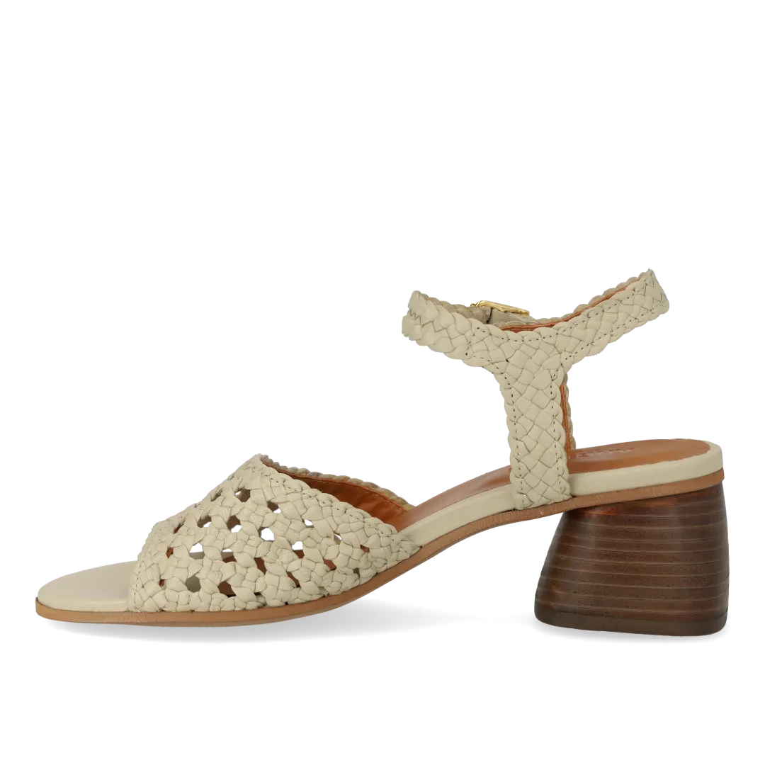Hand-braided sandal with sculptural heel