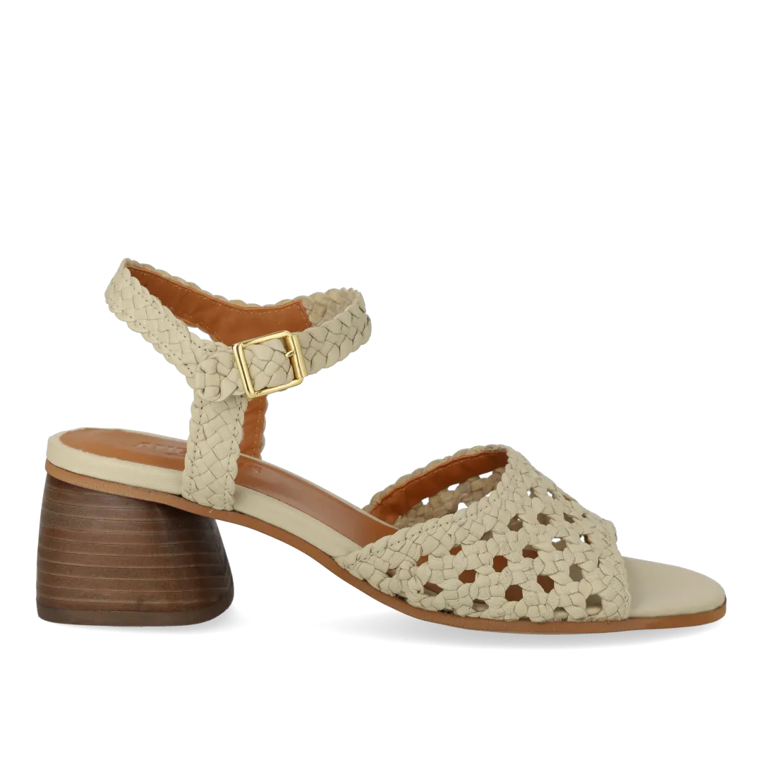Hand-braided sandal with sculptural heel