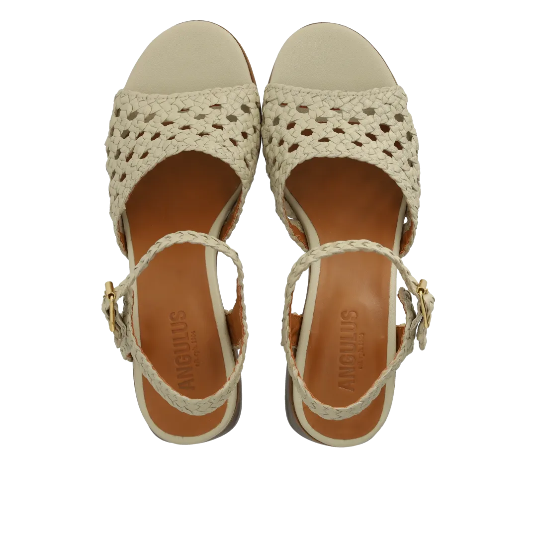 Hand-braided sandal with sculptural heel