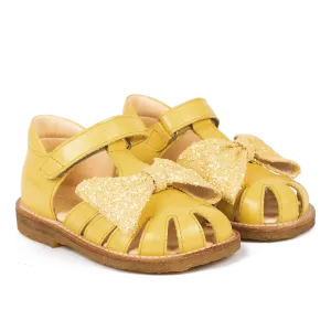 Starter sandal with glitter bow and velcro closure